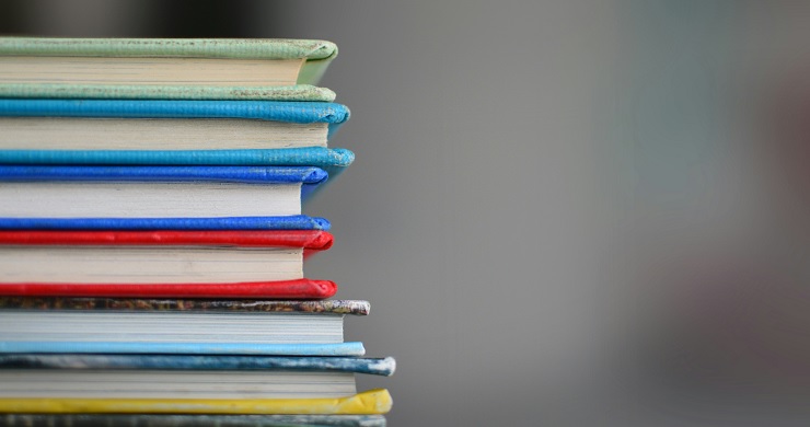 A picture of a stack of books. Education is Nothing